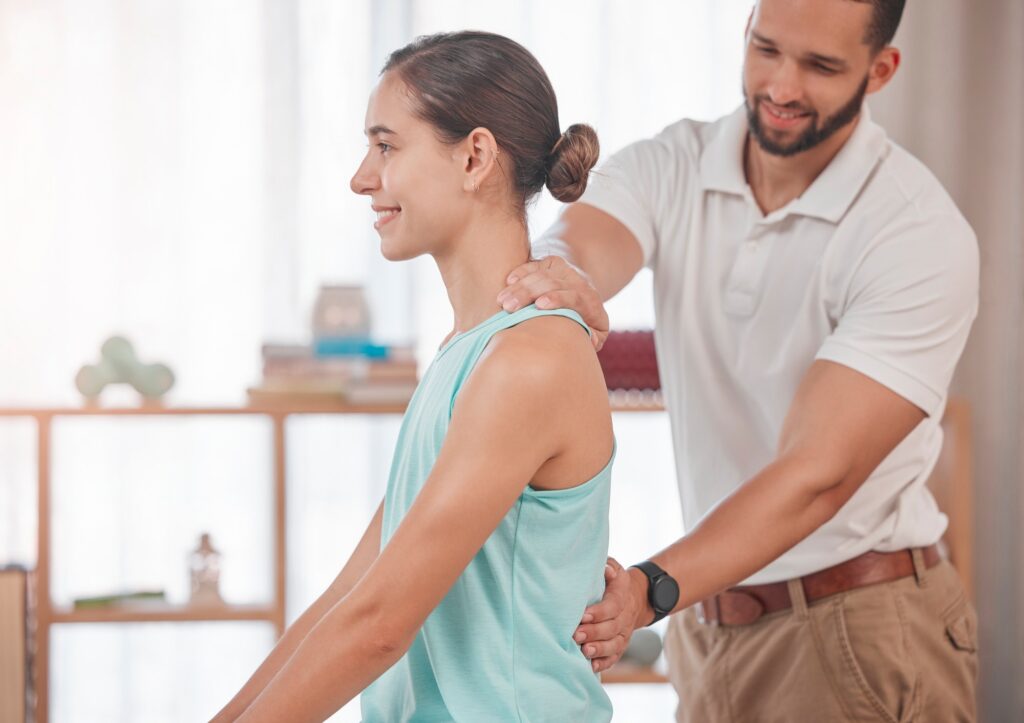 Physiotherapy, chiropractor and consulting with woman and doctor for healthcare, medical or sports